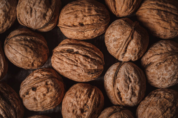 full frame of walnuts arranged as backdrop