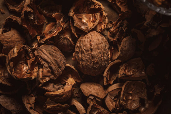 close up view of walnut husk as background