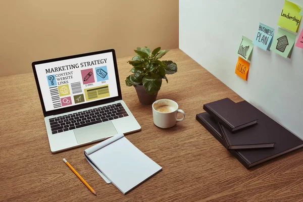 Laptop Marketing Strategy Lettering Icons Screen Notebooks Pencil Wooden Tabletop — Stock Photo, Image