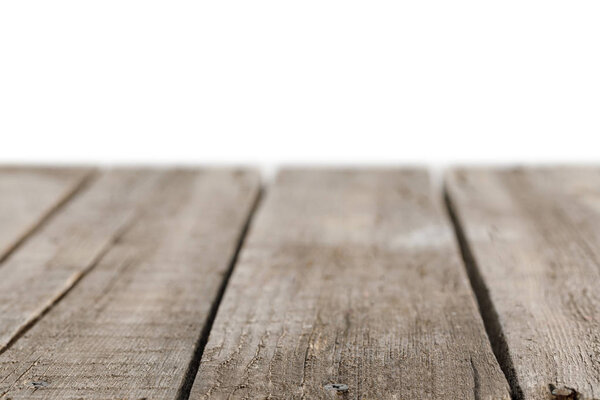selective focus of grey striped wooden background on white
