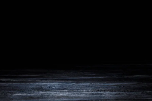 dark grey striped wooden surface on black