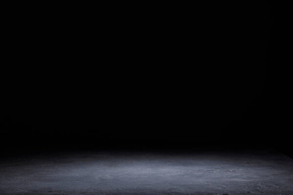 grey striped wooden board on black