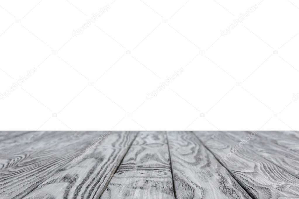 selective focus of grey striped wooden background on white