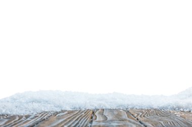 selective focus of striped wooden board covered with snow on white clipart