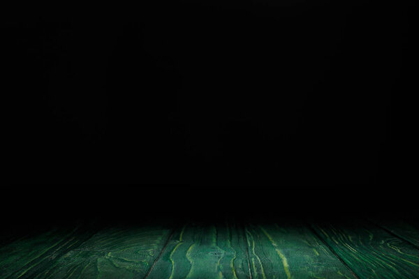 dark green striped wooden background on black