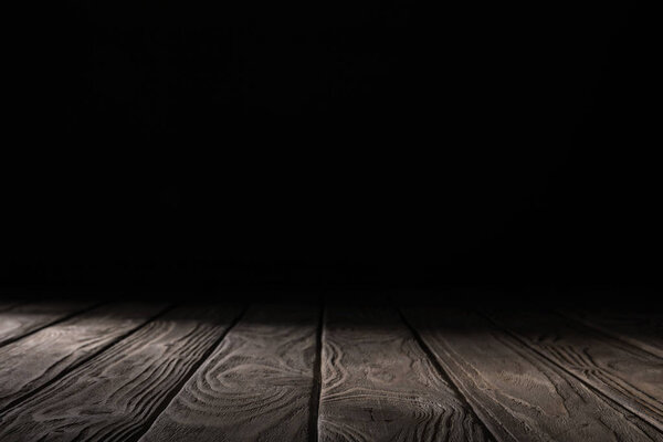 brown striped wooden tabletop on black