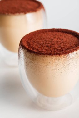 close up of tiramisu desserts with cocoa powder   clipart