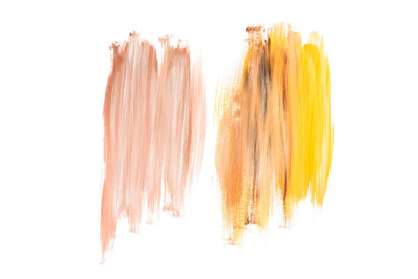 Abstract watercolor stains of beige and yellow isolated on white