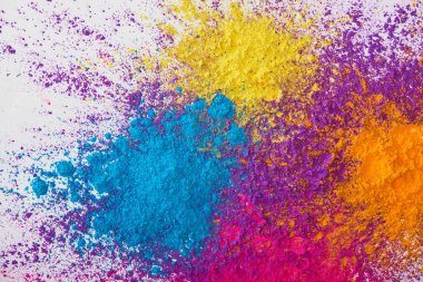 top view of explotion of yellow, purple, orange and blue holi powder on white background clipart