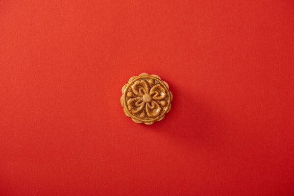 top view of traditional chinese mooncake isolated on red