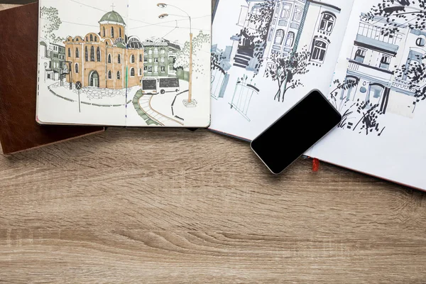 Vista Dall Alto Disegni Album Smartphone Sfondo Legno — Foto Stock