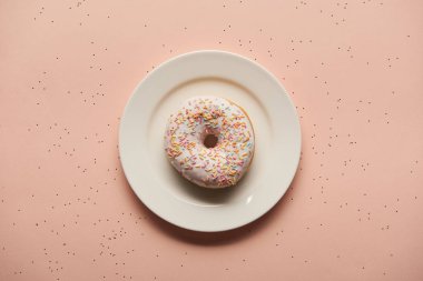 top view of sweet glazed doughnut on pink background clipart