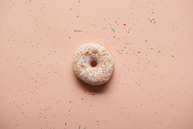 top view of sweet glazed doughnut on pink background clipart