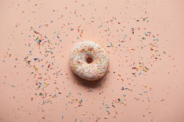 top view of tasty glazed doughnut on pink background clipart