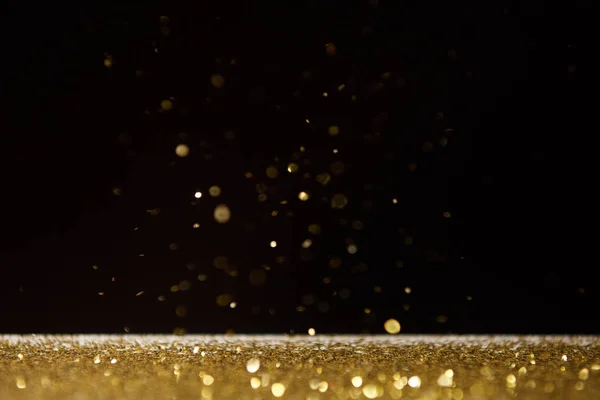 Selective Focus Bright Golden Sparkles Table Isolated Black — Stock Photo, Image