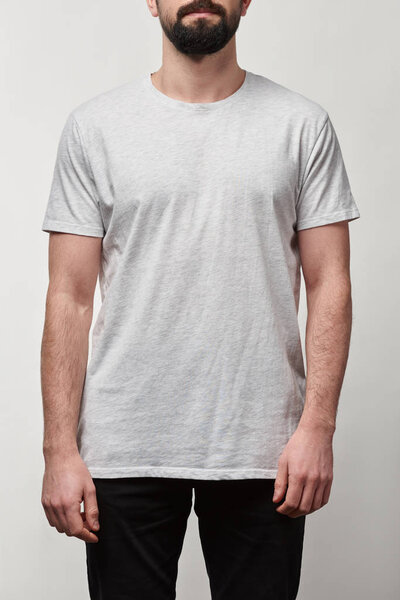 partial view of bearded man in white t-shirt with copy space isolated on grey