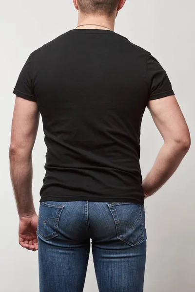 Widok Człowieka Czarny Shirt Powrotem Kopia Miejsce Białym Tle Szary — Zdjęcie stockowe