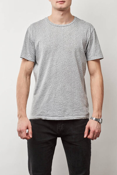 partial view of man in t-shirt with copy space isolated on grey