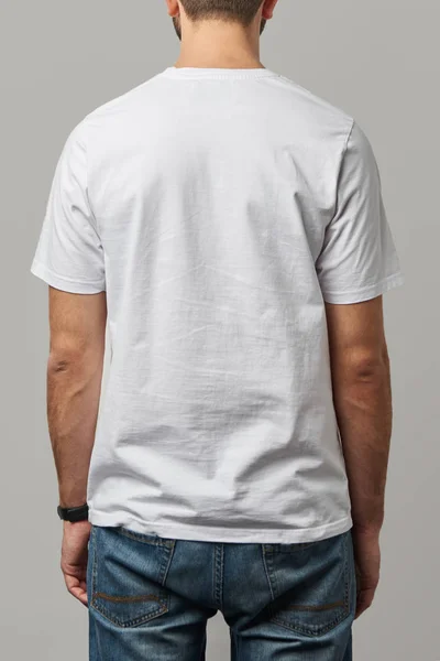 Baksidan Mannen Vit Shirt Med Kopia Utrymme Isolerad Grå Stockbild