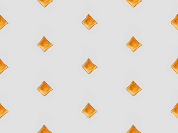  collage of grilled crispy toasts on grey background, seamless background pattern