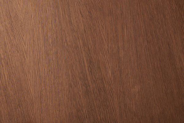 Верхний вид коричневой поверхности стола с деревянной текстурой
