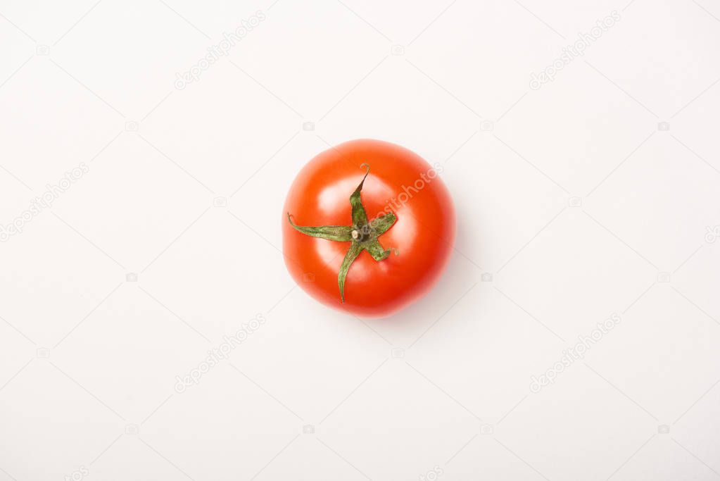 Top view of ripe tomato on white background