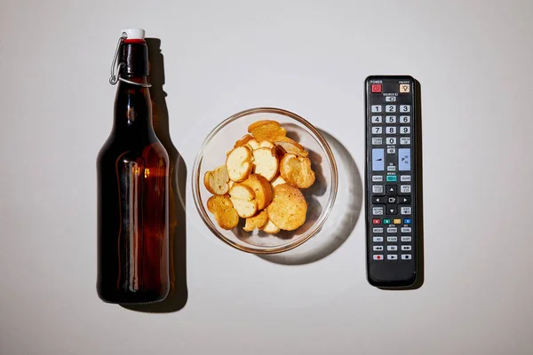 Top View Brown Bottle Beer Snack Bowl Remote Control White — Stock Photo, Image