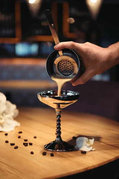 Bartender Pouring Cocktail Shaker Sieve Metal Glass Wooden Table — Stock Photo, Image