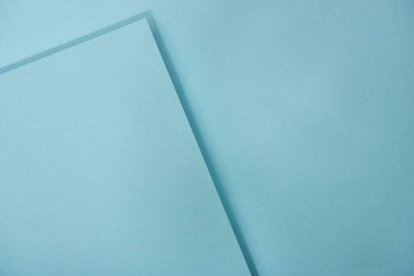 top view of blue laid out paper sheets with copy space clipart