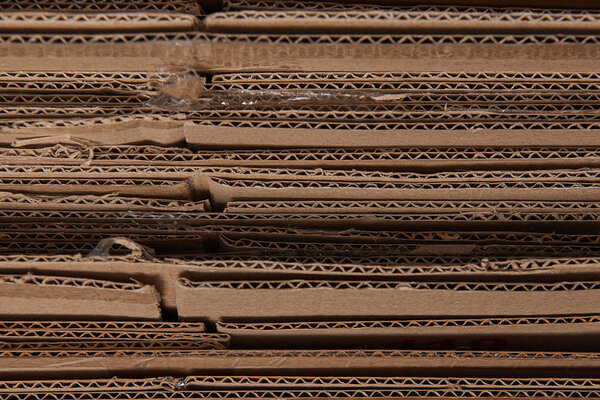 close up of brown corrugated folded cardboard 