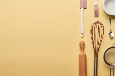 flat lay with cooking utensils on yellow background with copy space clipart