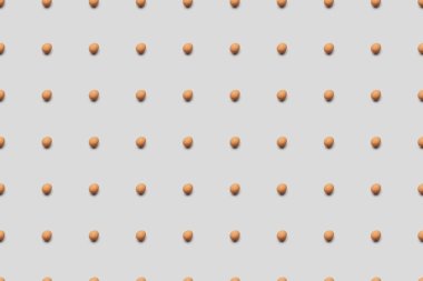 gri arka plan, seamless modeli üzerinde organik kahverengi yumurta