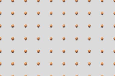 gri arka plan, seamless modeli üzerinde organik kahverengi yumurta