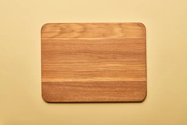 Top View Empty Wooden Chopping Board Yellow Background — Stock Photo, Image