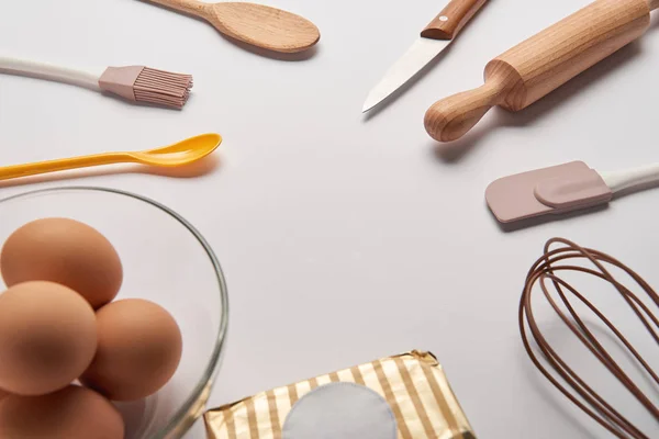 Cooking Utensils Butter Eggs Bowl Grey Surface — Stock Photo, Image