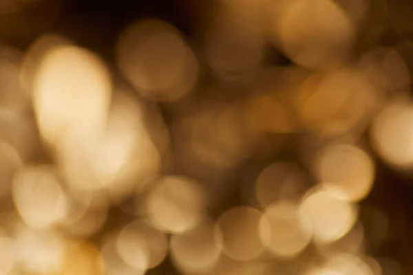 Luzes Cintilantes Douradas Fundo Preto Escuro — Fotografia de Stock