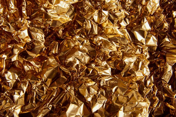 Top View Crumpled Golden Foil Glares — Stock Photo, Image