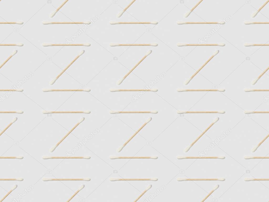 ear sticks on grey background, seamless background pattern