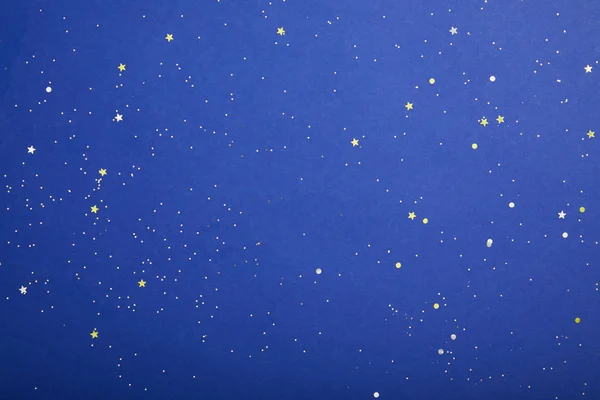 top view of violet starry background with copy space, earth day concept