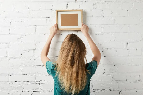 Back View Woman Holding Blank Square Frame Hands — Stock Photo, Image