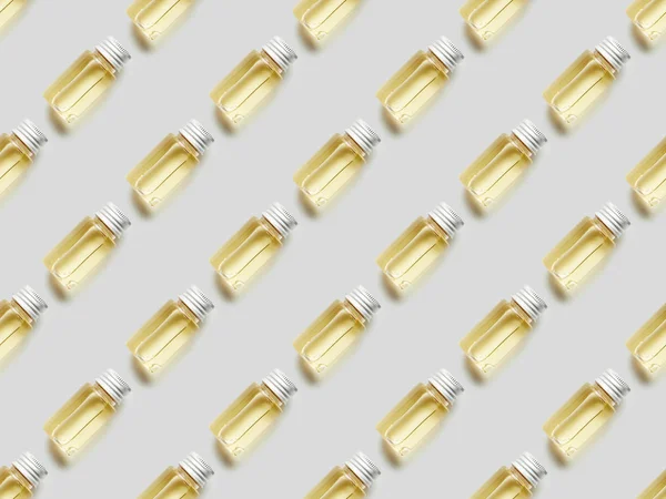 Плоский Лежав Пляшками Ефірної Олії Сірому Фоні — стокове фото