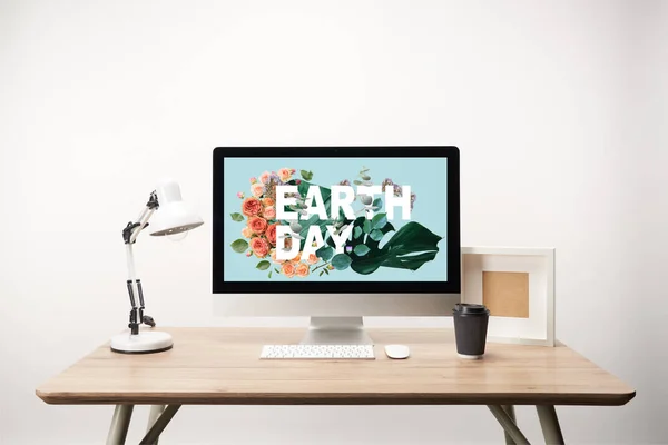 Computer Green Monstera Leaves Flowers Earth Day Lettering Monitor Wooden — Stock Photo, Image