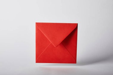 red and colorful envelope on grey background with copy space  clipart