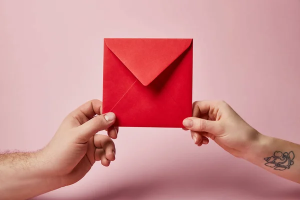 Partial View Woman Tattoo Man Holding Red Envelope Pink Background — Stock Photo, Image