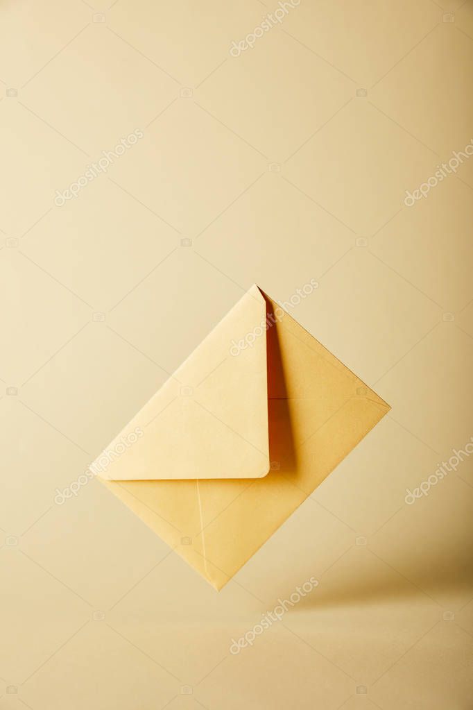 Yellow and bright envelope on colorful background with copy space