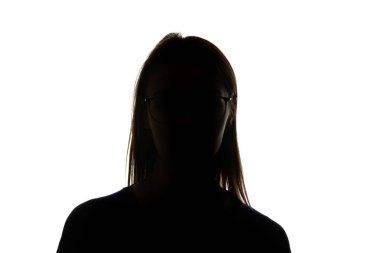 Silhouette of woman in glasses looking at camera isolated on white clipart