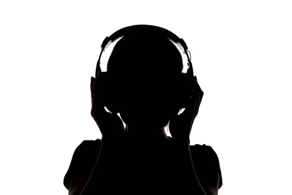 Silhouet Van Meisje Hoofdtelefoon Luisteren Muziek Hoofdtelefoon Geïsoleerd Wit — Stockfoto