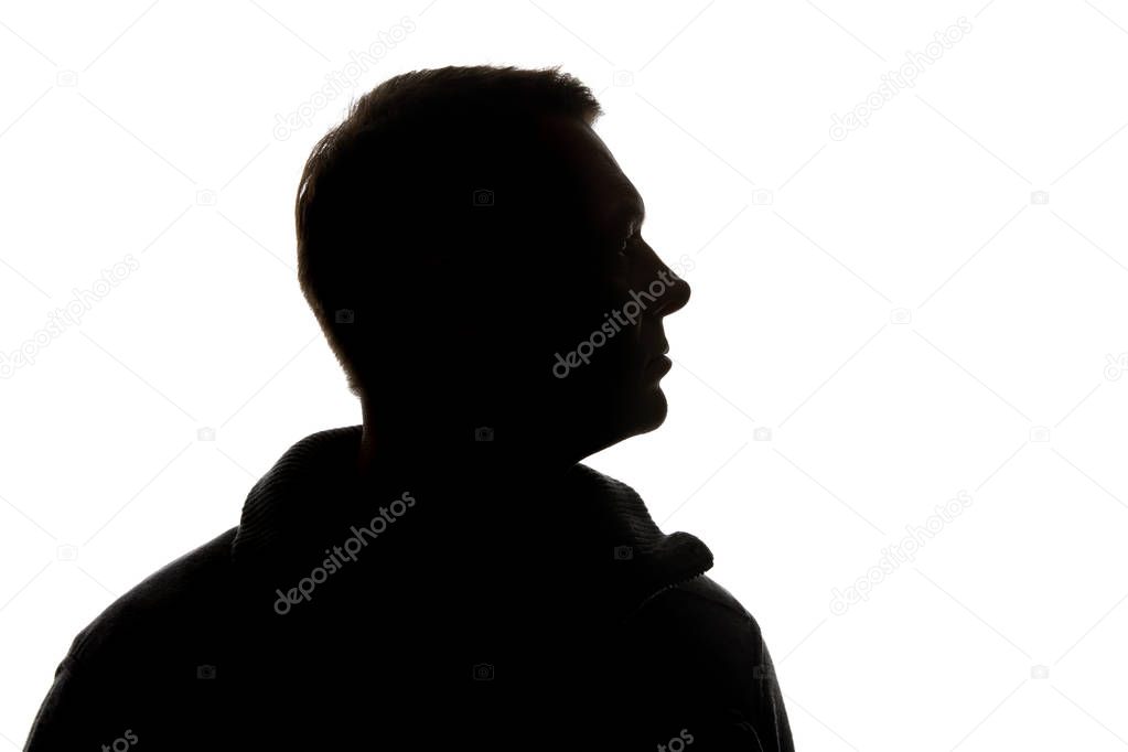 Silhouette of man looking away isolated on white