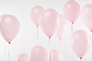 arka plan üzerinde beyaz izole pembe şenlikli balonlar ile