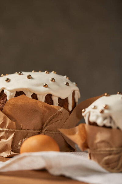 traditional easter cakes decorated with frosting and sprinkles with copy space